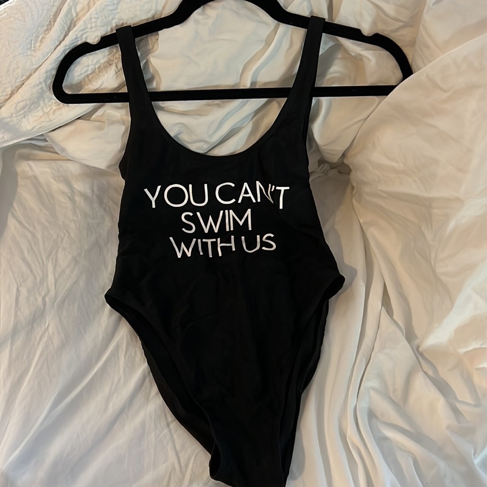 Black one piece swimsuit / perfect for a bachelorette party if it’s themed
